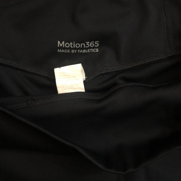 Fabletics black workout capris with back details. Motion365 Made by Fabletics. - Picture 2 of 4